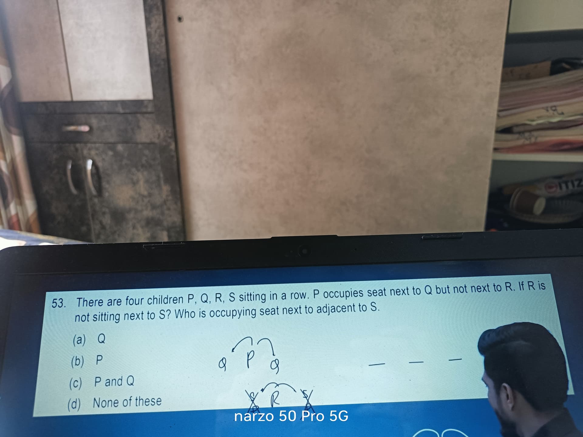 Image attached to the doubt: In this question it is asked who is sitting next to adjacent to s, so it will…